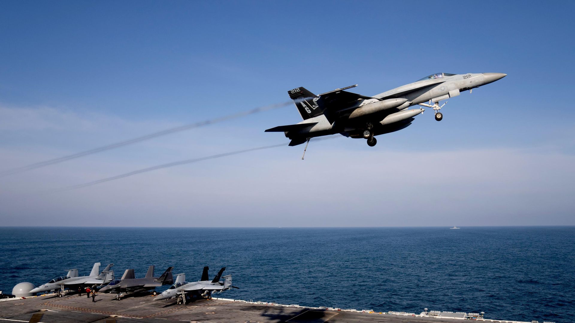 US military aircraft on the deck of an aircraft carrier during operations against Iran in 2026
