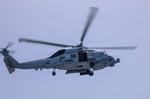 US Navy MH-60S Seahawk helicopter operating from USS George H.W. Bush during Operation Epic Fury in Arabian Sea