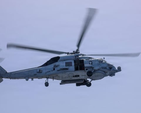 US Navy MH-60S Seahawk helicopter operating from USS George H.W. Bush during Operation Epic Fury in Arabian Sea