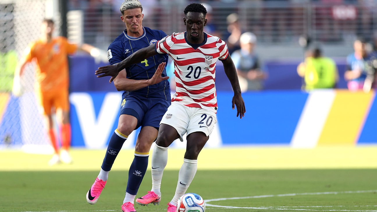Folarin Balogun of the United States is challenged during the FIFA World Cup 2026 Round of 32 match against Bosnia and Herzegovina in Santa Clara