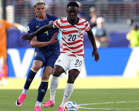 Folarin Balogun of the United States is challenged during the FIFA World Cup 2026 Round of 32 match against Bosnia and Herzegovina in Santa Clara