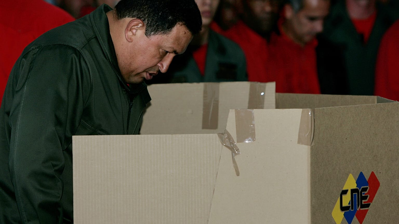 Nicolás Maduro at a podium in Venezuela, whose election fraud system ran from Chávez's 2012 campaign through Maduro's 2024 defeat per CIA documents