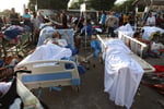 Rescue workers amid earthquake damage in Venezuela after the June 24 doublet earthquake