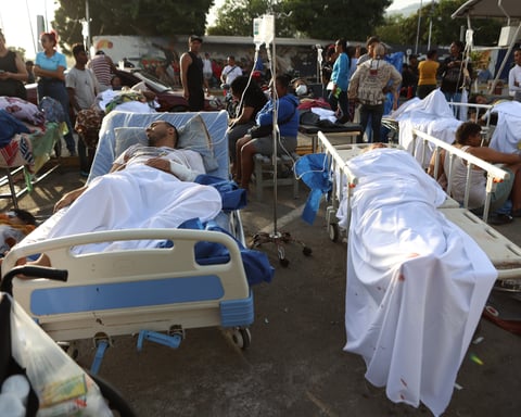 Rescue workers amid earthquake damage in Venezuela after the June 24 doublet earthquake