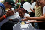 A funeral procession in La Guaira as Venezuela earthquake death toll approaches 5,000 victims