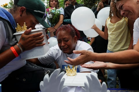 A funeral procession in La Guaira as Venezuela earthquake death toll approaches 5,000 victims