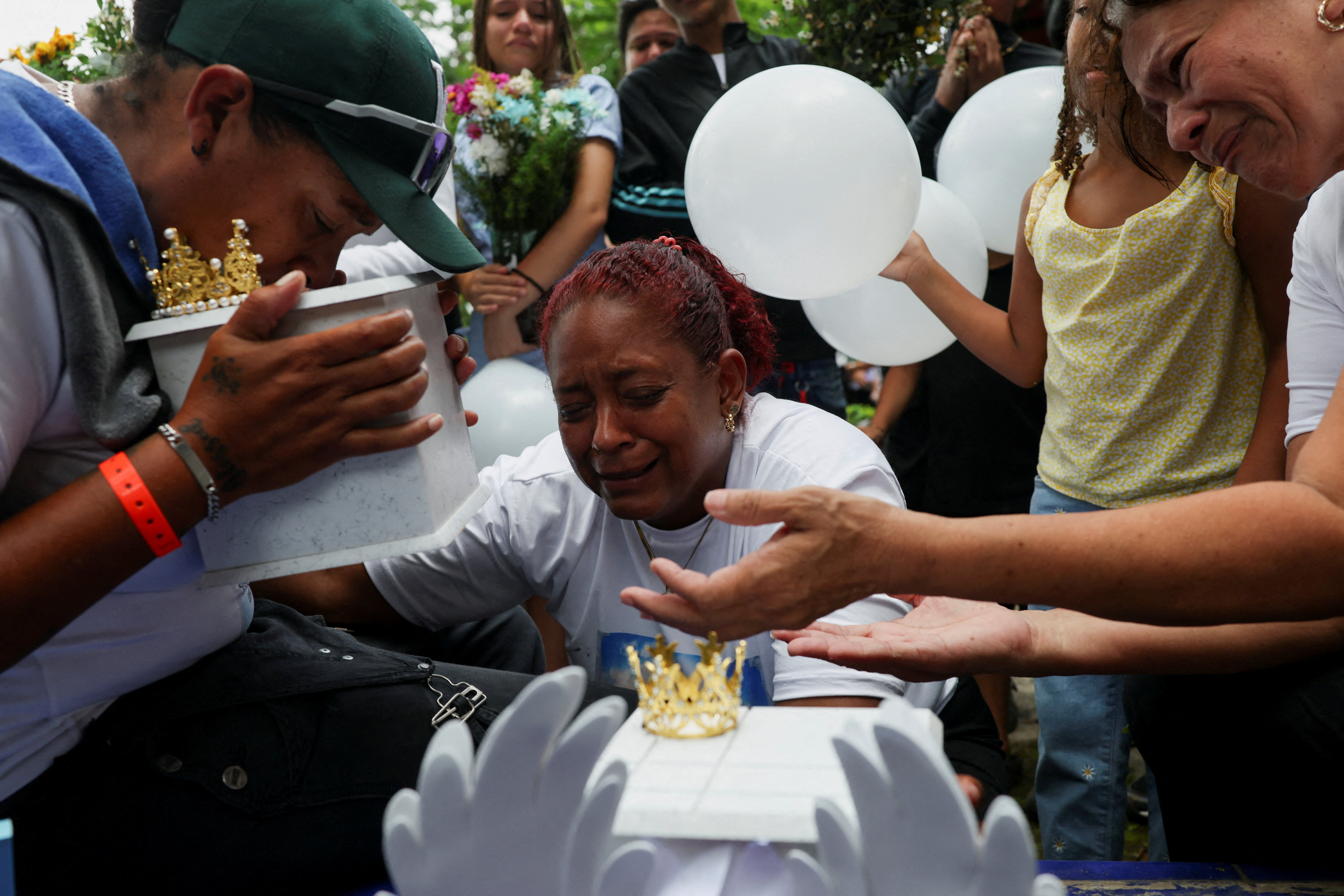 A funeral procession in La Guaira as Venezuela earthquake death toll approaches 5,000 victims