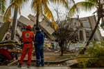 Rescue workers search rubble in La Guaira after Venezuela earthquake kills 3811