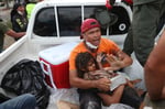 Rescue workers search rubble in La Guaira Venezuela after June 2026 earthquakes