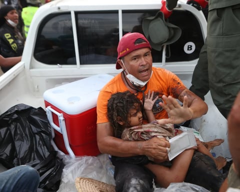 Rescue workers search rubble in La Guaira Venezuela after June 2026 earthquakes