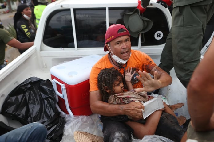 Rescue workers search rubble in La Guaira Venezuela after June 2026 earthquakes