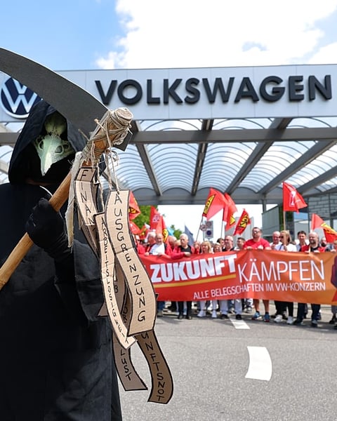 Volkswagen workers protest outside Zwickau plant against 100,000 job cuts plan