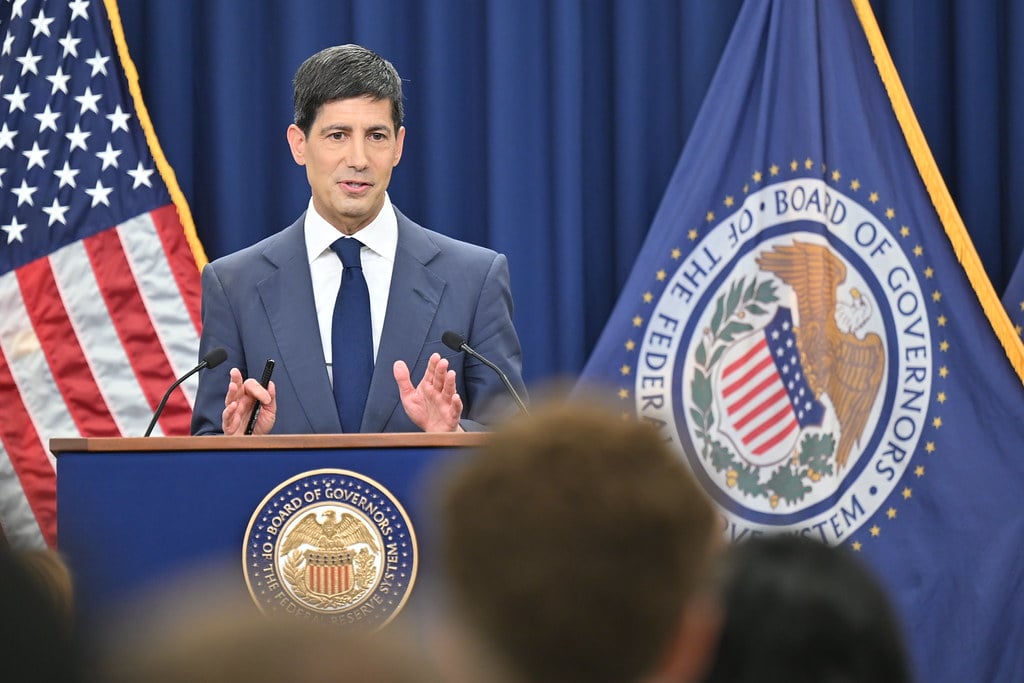 Federal Reserve Chair Kevin Warsh speaks at the Board of Governors podium during a 2026 press conference