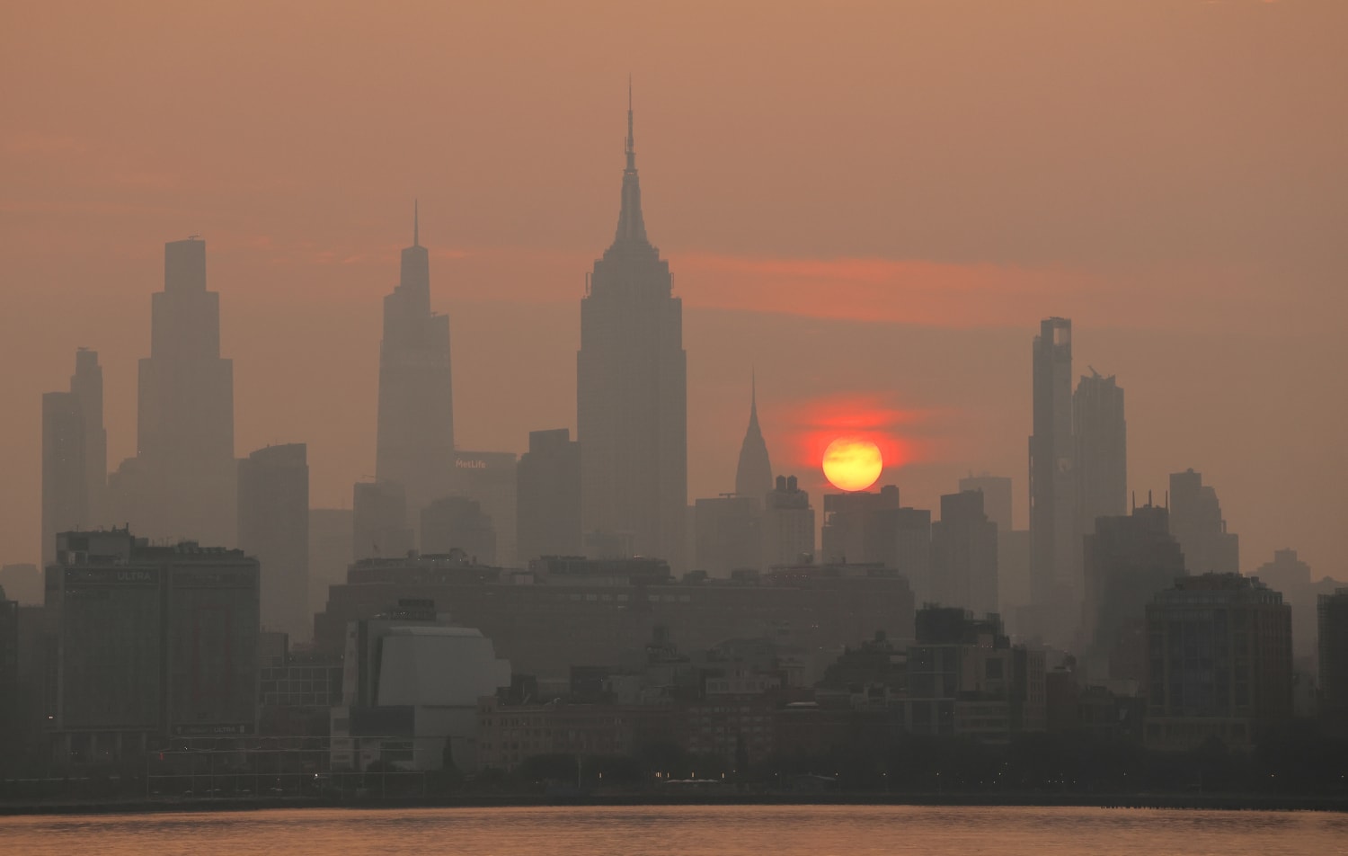 Orange hazy sky over New York City from Canadian wildfire smoke July 2026