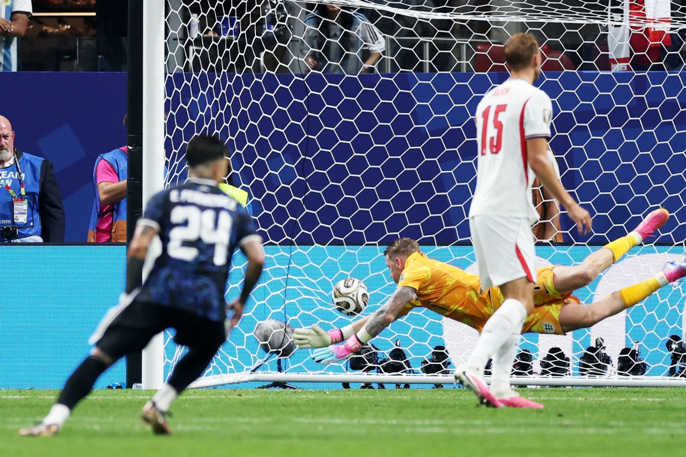 Players on the pitch during the England versus Argentina FIFA World Cup 2026 quarter-final match at which mandatory hydration breaks were observed