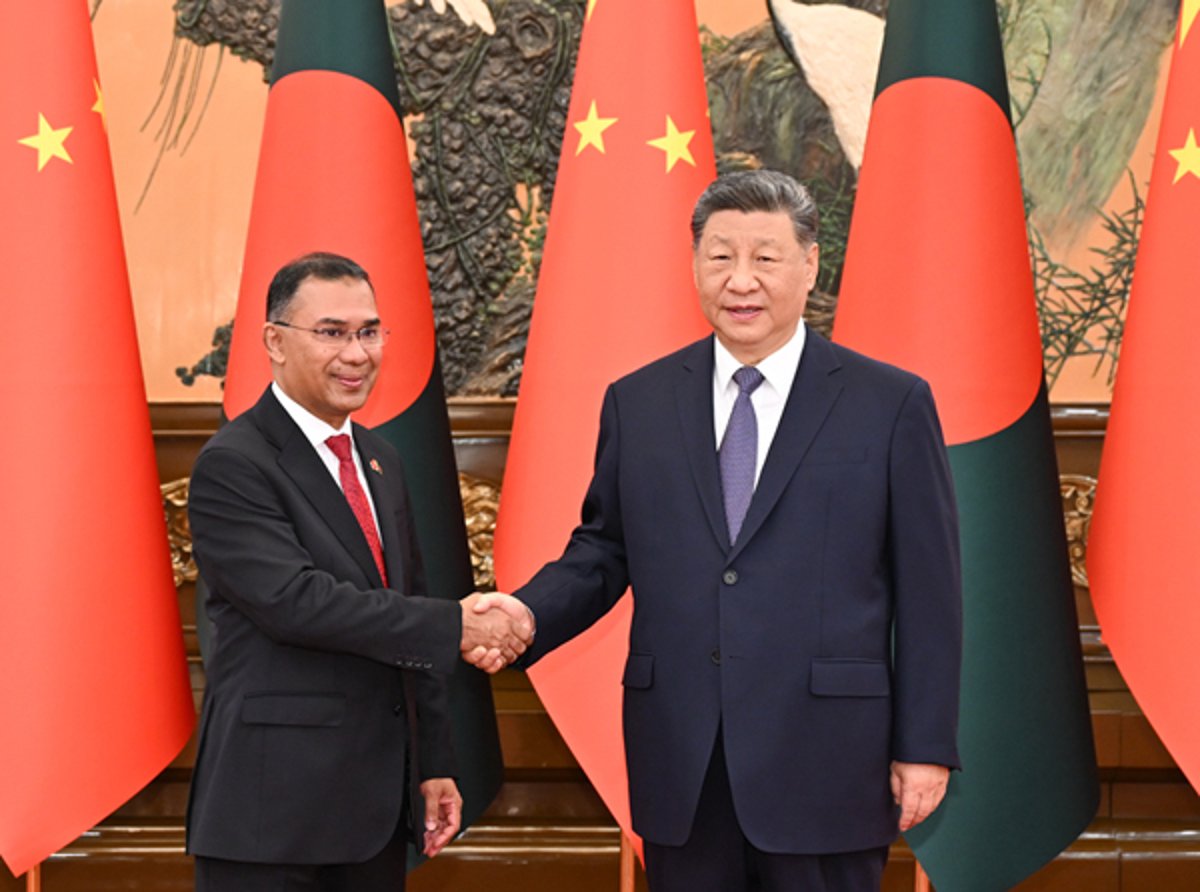 Chinese President Xi Jinping shakes hands with Bangladesh Prime Minister Tarique Rahman at the Great Hall of the People in Beijing