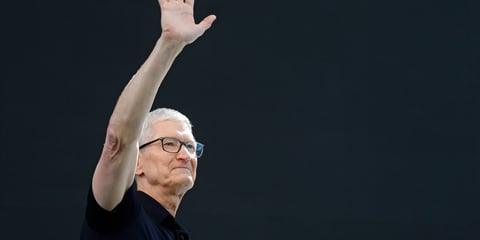 AAPL stock today: Apple chief executive Tim Cook waves to an audience in Cupertino, California, before handing over to John Ternus