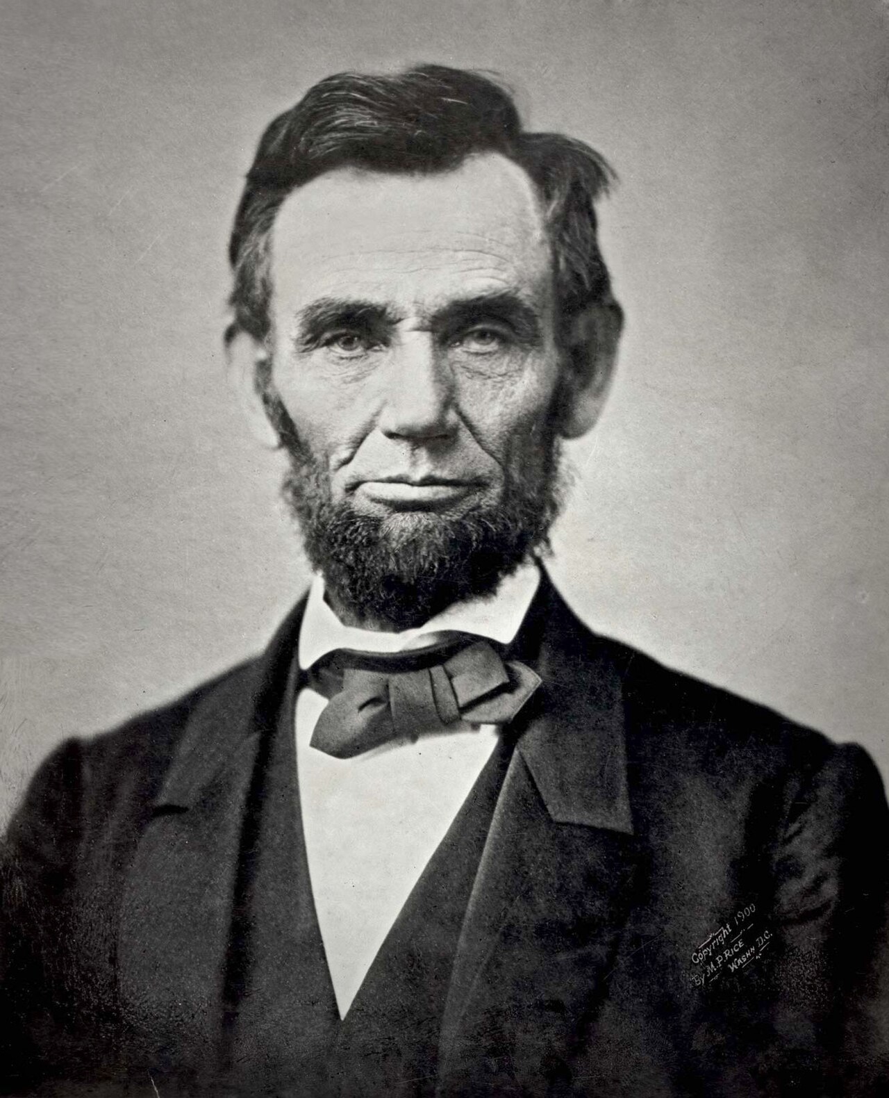 Abraham Lincoln in a bow tie and dark coat, photographed by Alexander Gardner on 8 November 1863