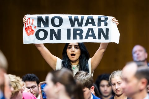 Anti-war protesters at the US Defense Department demanding Trump removal during the Iran-Israel war — backdrop to Major Jason Watson's UCMJ charges
