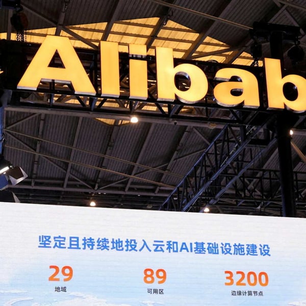 An Alibaba Cloud exhibition stand advertising the company's continuing investment in cloud and AI infrastructure