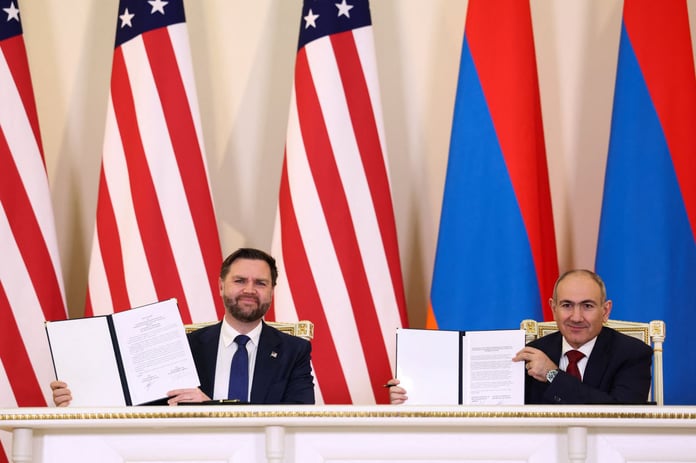 Nikol Pashinyan and JD Vance hold signed copies of the Armenia-US civil nuclear agreement in Yerevan