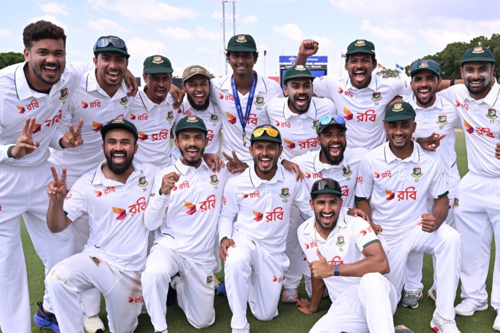 Bangladesh players celebrate after beating Australia by nine wickets in the first Test at Marrara Oval in Darwin