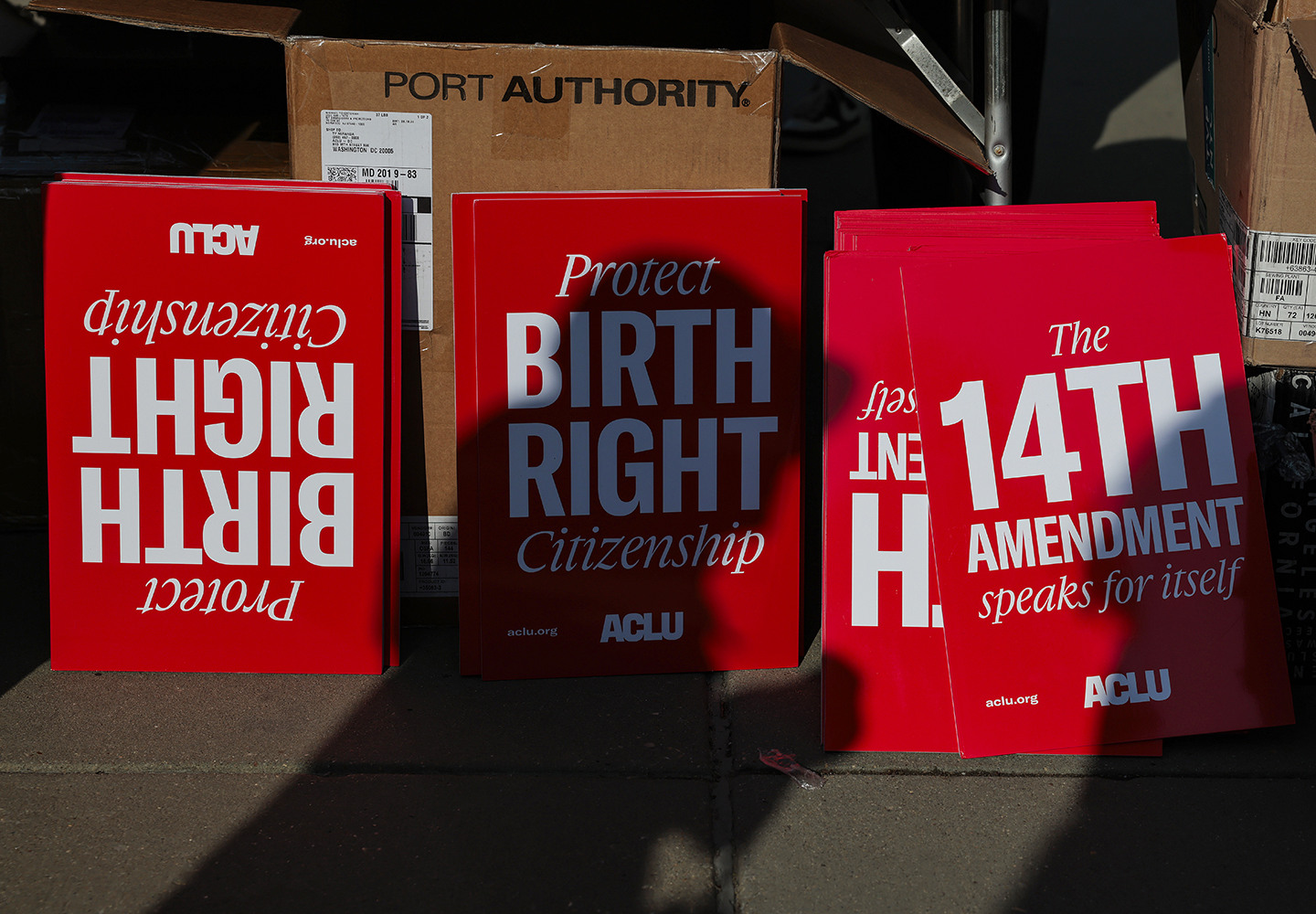 Birthright citizenship placards held during a demonstration outside the US Supreme Court in April 2026