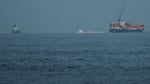 Cargo and container ships navigating the Black Sea shipping lane