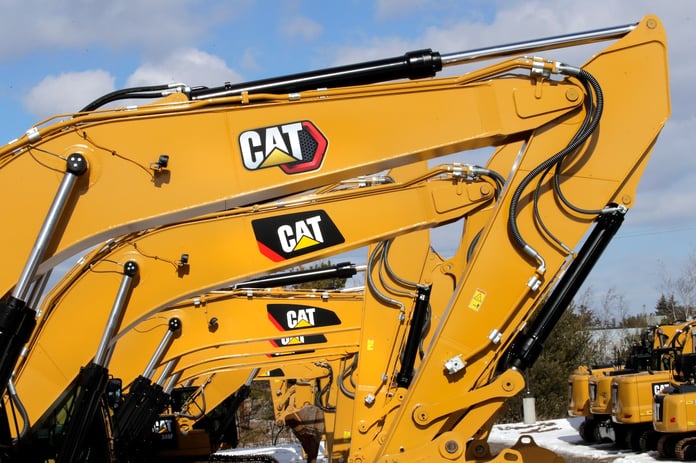 Caterpillar heavy equipment at work as the company posts record Q2 2026 revenue of $20.5 billion