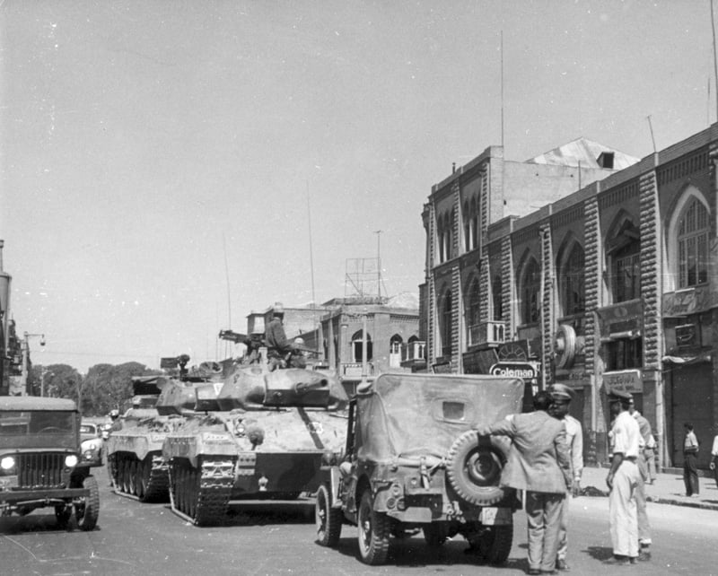Military tanks roll through Tehran streets during the CIA-backed coup that overthrew Prime Minister Mosaddegh in August 1953