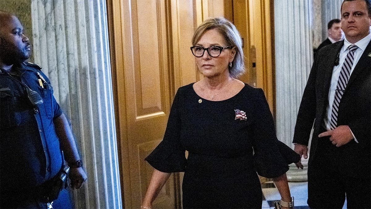 Darline Graham Nordone walks into the Senate chamber after being sworn in as South Carolina’s first female senator in July 2026