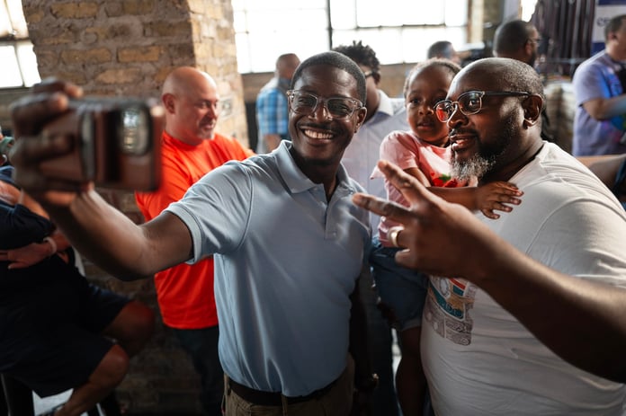 David Crowley speaks at a campaign rally during the 2026 Wisconsin Democratic governor primary
