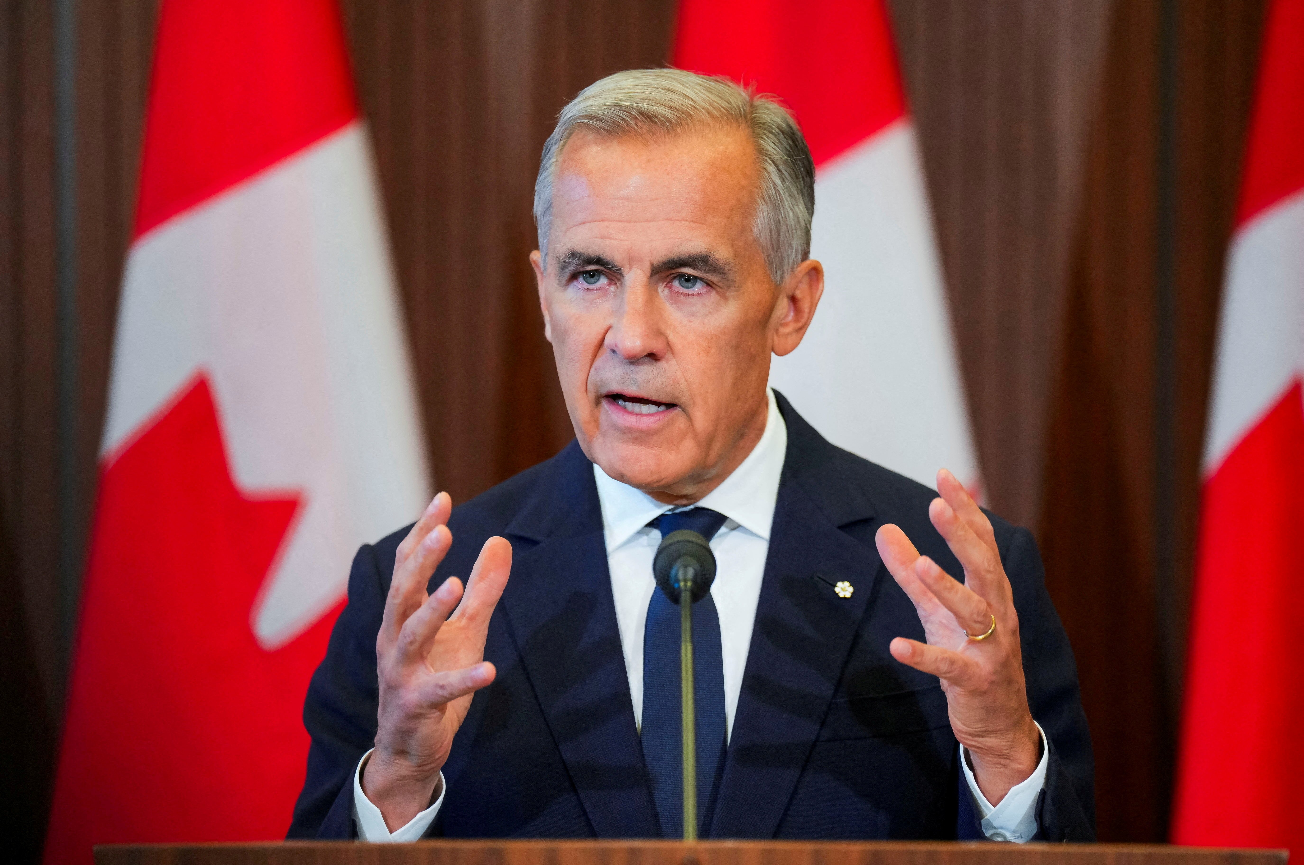 Dow Jones today: Canadian Prime Minister Mark Carney speaking to reporters in Ottawa after suspending trade negotiations with the United States