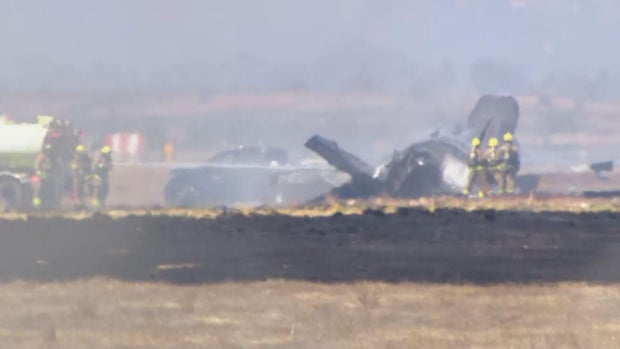 Emergency crews and fire retardant at the F-35B crash scene at MCAS Miramar San Diego July 2026