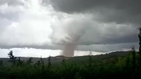 Emergency crews respond to tornado damage in Pomas village, Aude department, southwestern France, August 2026