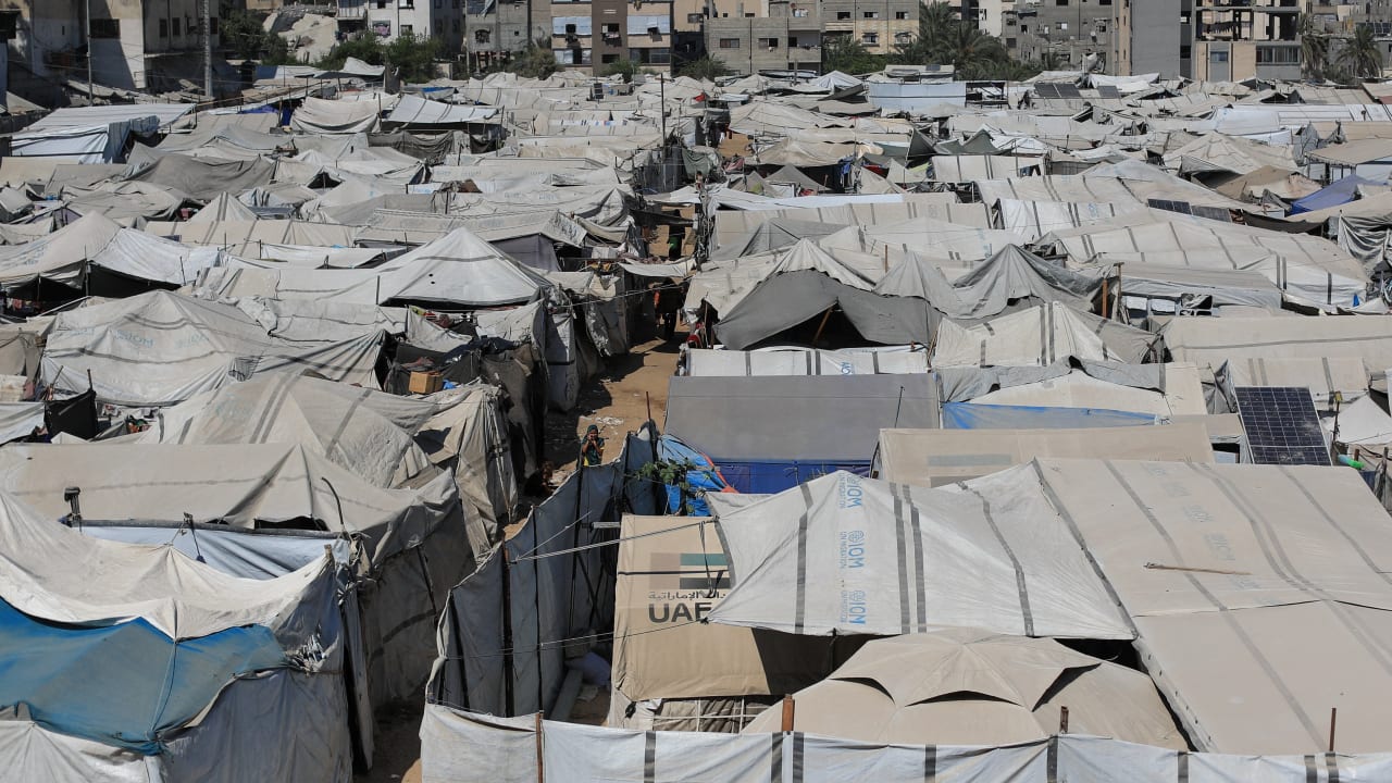 Displaced Palestinians in tent camp in Gaza City as conflict continues under Israeli military presence August 2026