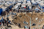 Palestinians inspect overnight Israeli strike on medicine warehouse at Al-Aqsa Martyrs Hospital, Deir el-Balah, Gaza