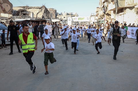 Children participating in marathon for Gaza orphans in Khan Younis