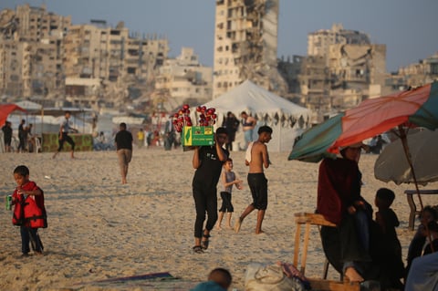 Displaced Palestinians gather on Gaza City beachfront as Gaza genocide toll surpasses 73000 and ceasefire talks stall