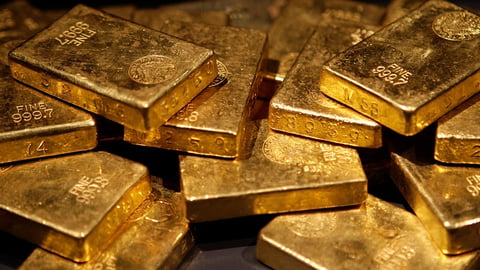 Stacked gold bars, the metal that hit a 15-week high before Kevin Warsh's first Jackson Hole speech