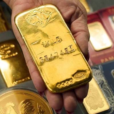 Gold bars and bullion, the benchmark for the gold rate today as 22K trades near 14,220 rupees a gram