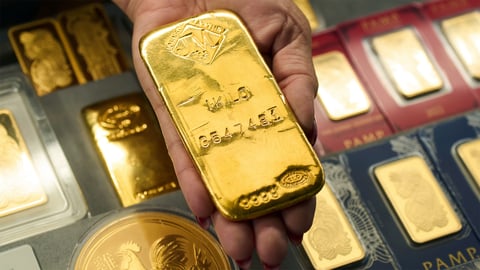 Gold bars and bullion, the benchmark for the gold rate today as 22K trades near 14,220 rupees a gram