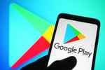 Google Play Store logo on a smartphone screen showing Android app marketplace