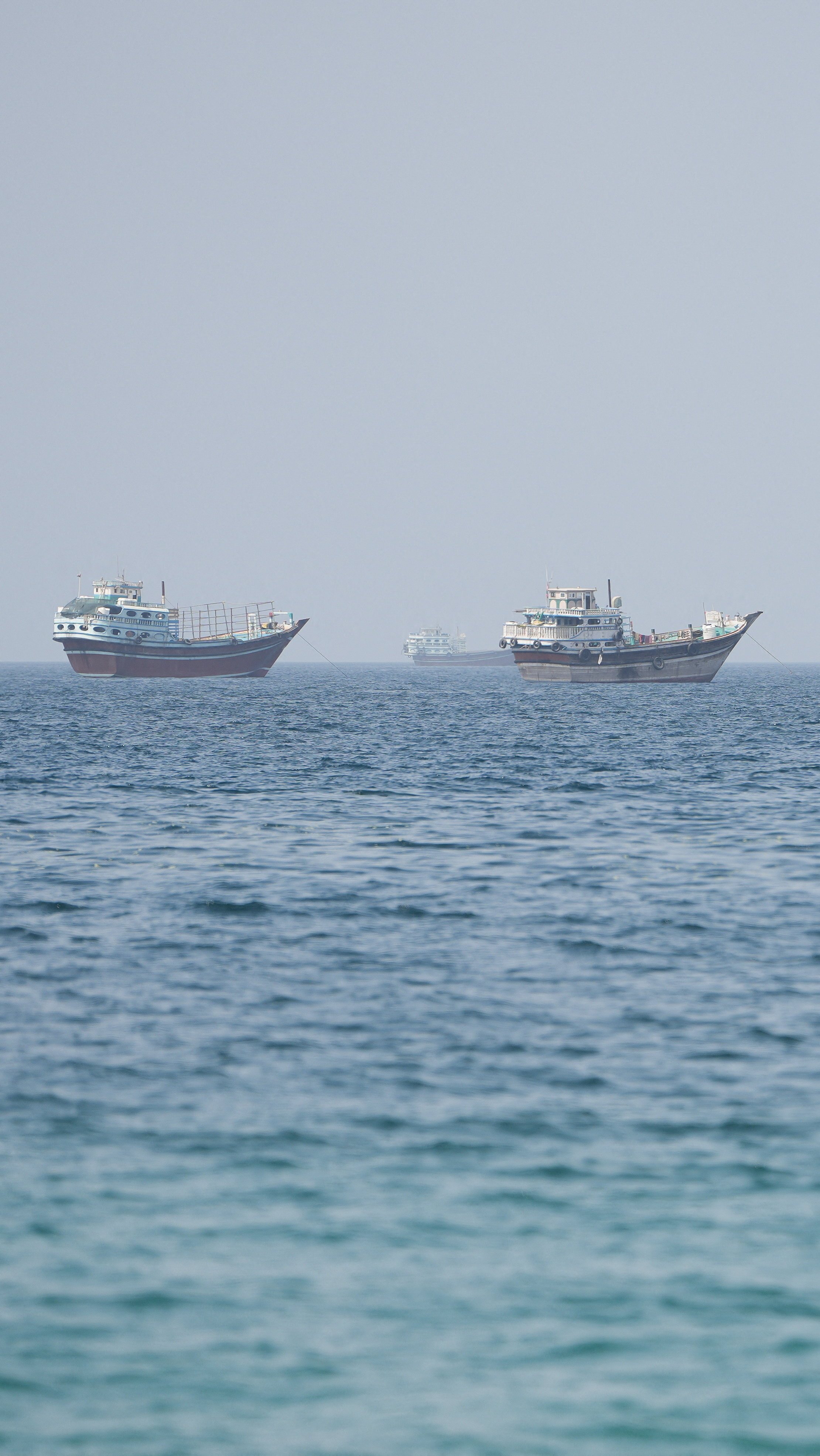 Commercial vessels transiting the Strait of Hormuz as Iran parliament approves bill banning US and Israeli ships August 2026