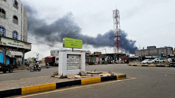Smoke rising from Mocha port Yemen after Houthi drone and missile strike killing seven August 2026
