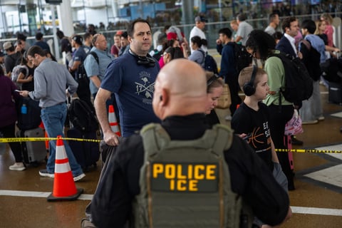 ICE officers conduct enforcement at US airport 2026 as immigration detentions reach record high