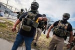 US Immigration and Customs Enforcement ICE officers during immigration enforcement operation 2026