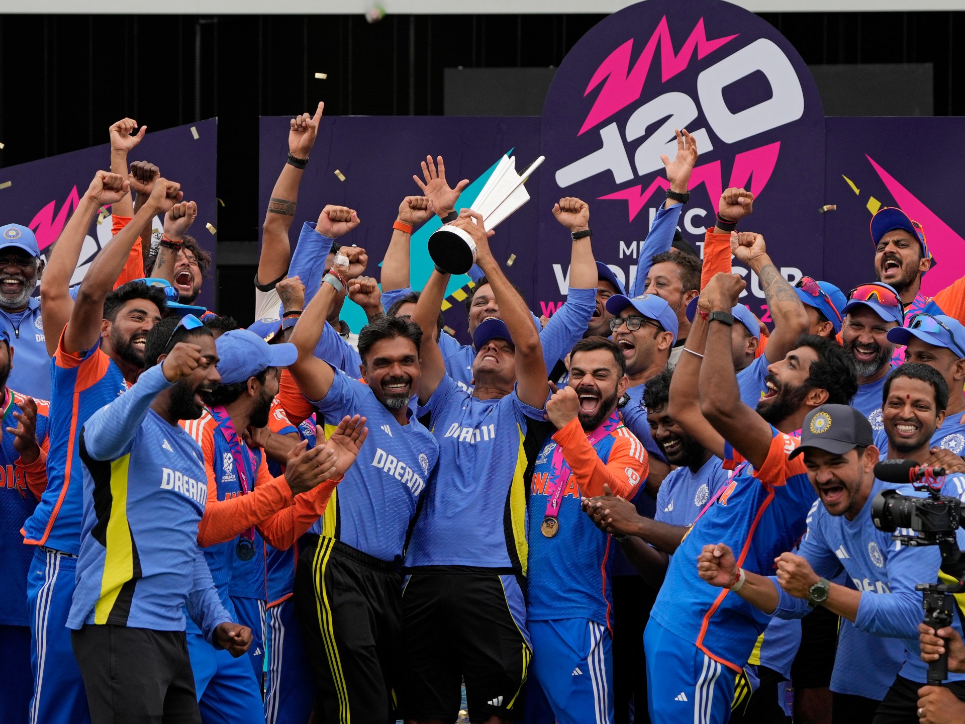 India players celebrate after beating South Africa by seven runs in the ICC Men's T20 World Cup 2024 final at Kensington Oval in Bridgetown, Barbados