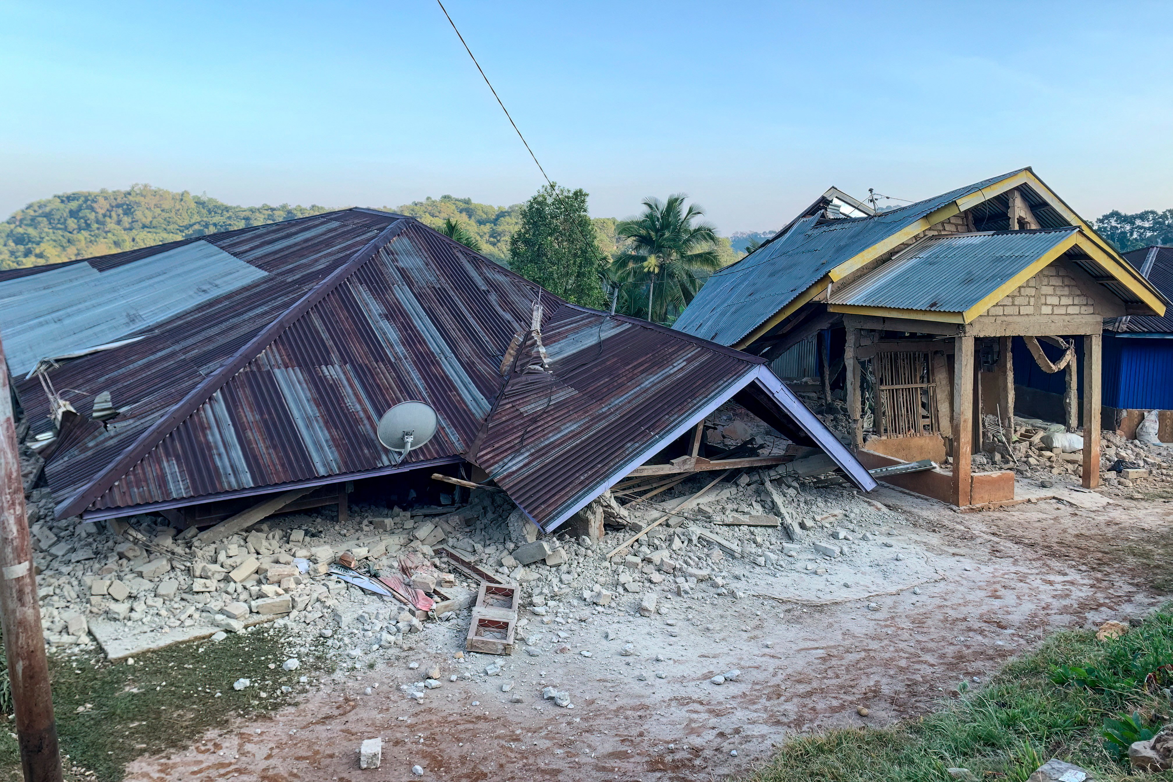 Damaged residential buildings in Ruteng Manggarai East Nusa Tenggara following the 7.7-magnitude Flores Island earthquake August 2026