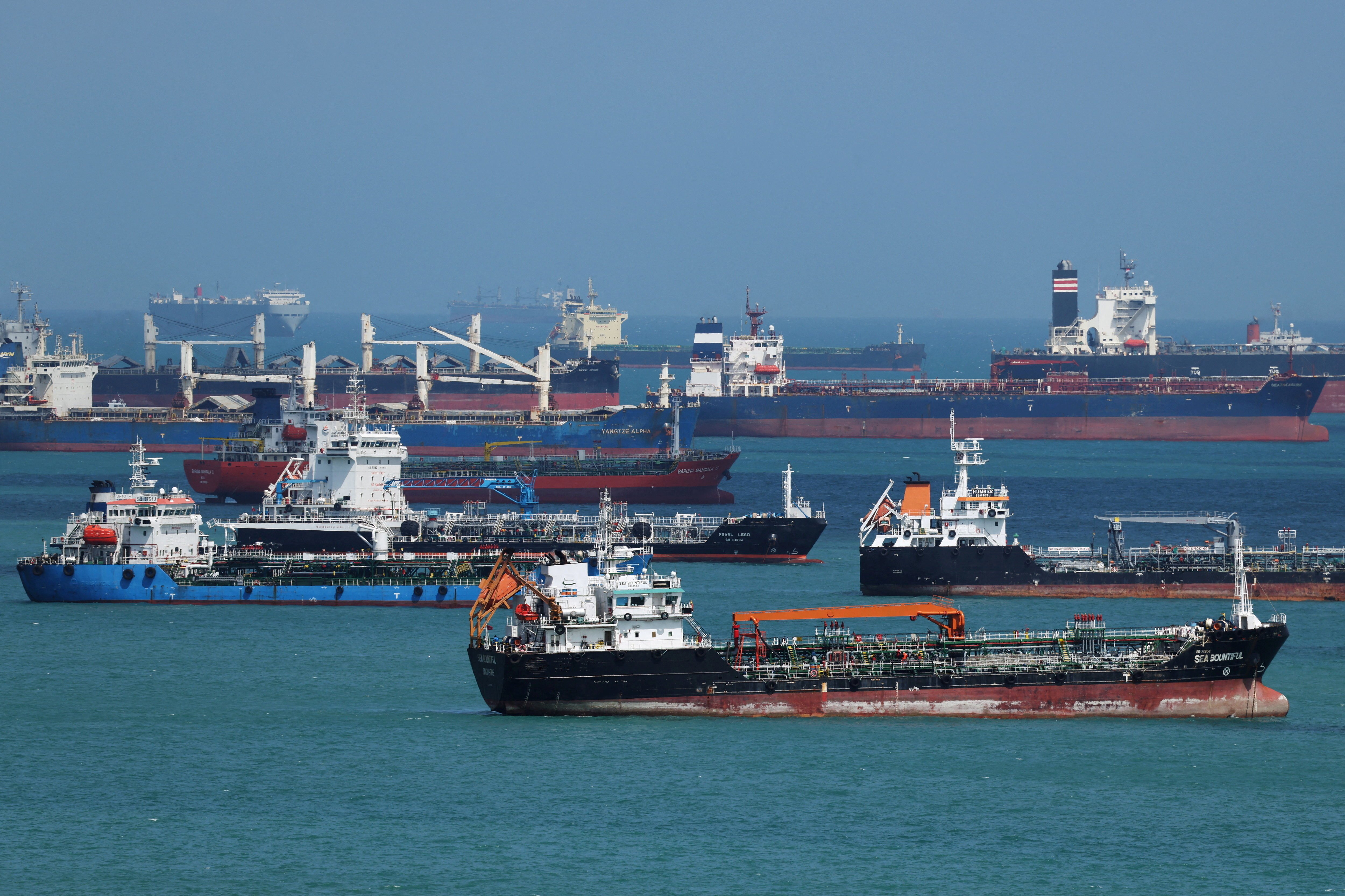 Oil tankers sailing through contested waters amid Iran IRGC operations in the Strait of Hormuz